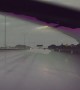 Car Spins Out on Slippery Highway