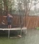 Family Turns Flooded Backyard into Canoe Fun