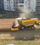Farmer That Refused to Sell Land Harvests Between Apartment Buildings