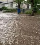 Flash Flooding Sends Coach Floating Down the Street