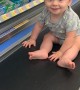 Baby Rides Grocery Conveyer Belt