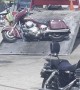 Tow Truck Drags Motorcycle Up Ramp