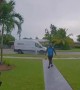 Delivery Driver Dances Down Walkway