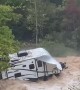 Camp Trailer Stuck in River Flood Waters