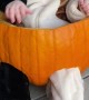 Baby Laughs in Pumpkin Chair