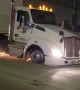 Big Rig Drives on Rims During Police Pursuit