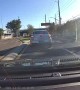 Distracted Driver Nearly Crashes