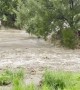 Backyard Becomes Raging Torrent During Flood Event