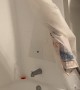 Plumber Snakes the Shower Curtain