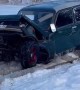 Car Collapses During Frozen Lake Recovery