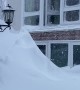 Man Leaps Into Giant Snow Pile