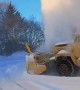Old SnoGo Truck Launching Snow High into the Air