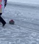 Curling Player Takes Hard Fall on Ice
