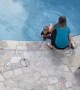 Mom saves kid after jumping in the pool