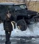 Jeep Trying to Cross Snowbank Gets Stuck