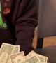 Kid Scores Big at Scoop the Money Game