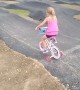 Girl on Bike with Training Wheels Fails at Pump Track