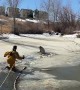 Firefighter rescues dog from frozen pond
