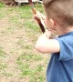 4-Year-Old Archer Hits Swinging Target