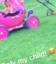 Kid Mows Lawn With Toy Car