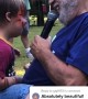 Grandpa sweetly serenades happy little kid