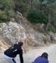 Girl Running Against Friend in Mountain Race Trips Over Her Foot