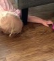 Toddler Has a Hard Time Reaching for Toy