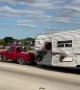 Small Truck Tows Long Trailer
