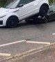 Car Stuck Under SUV