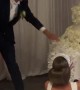 Groom Smashes Cake in Bride's Face