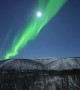 Auroras Dancing Under a Full Moon
