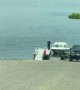 Driver Struggles to Back Boat Trailer into the Lake