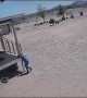 Kid Riding His Bike Gets Caught in Dust Devil