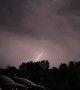 Slow Motion Lightning Branches Through Dark Skies
