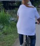 Cat Rides on Owner Riding a Bike