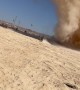 Men Run Toward Massive Dust Devil