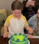 Kid Smashes Face into Birthday Cake