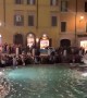 Swimming in the Trevi Fountain in Rome