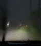 Lightning Strikes Near Moving Car