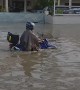 Motorcyclist Makes Valiant Attempt to Drive Through a Flood
