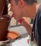 Guy Trying to Lick Chocolate Fountain Fails