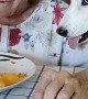 Husky and Grandmother Eat Together