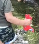 Little Boy Falls in Pond