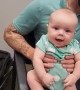 Baby Reacts to Receiving Hearing Aid