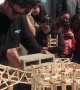 Interns Show Off Popsicle Stick Bridges