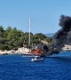 Yacht Burns on the Water