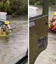 Firefighter breaks into car during rescue as Hurricane Ian hits Florida