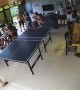 Guy Playing Ping Pong Takes a Dive on the Table