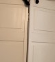 Cat Squeezes Through Closet Door