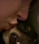 Miniature Pinscher Makes Funny Noise Receiving Kissing